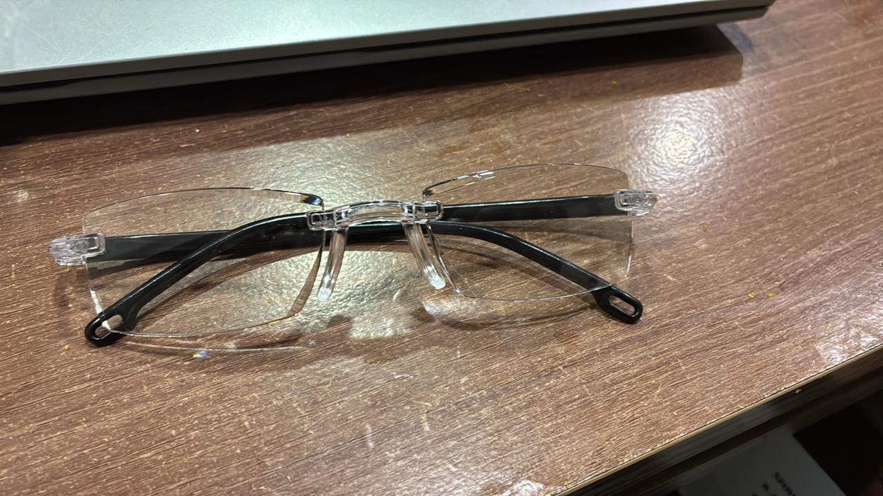 Professional computer glasses with blue light blocking technology close-up detail | DropDash